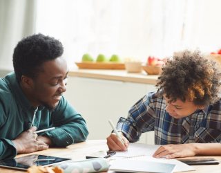 African,Father,Helping,To,His,Son,To,Study,During,Online